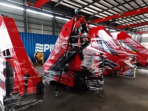 Waxing and film wrapping for crane anti-rust protection.