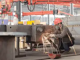 Detail-oriented hand deburring for precision crane parts.