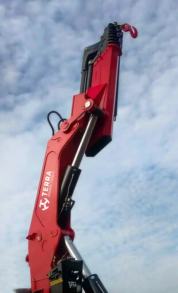 Close-up of TERRA knuckle boom crane’s high-tensile steel folding arm and premium hydraulic cylinders.